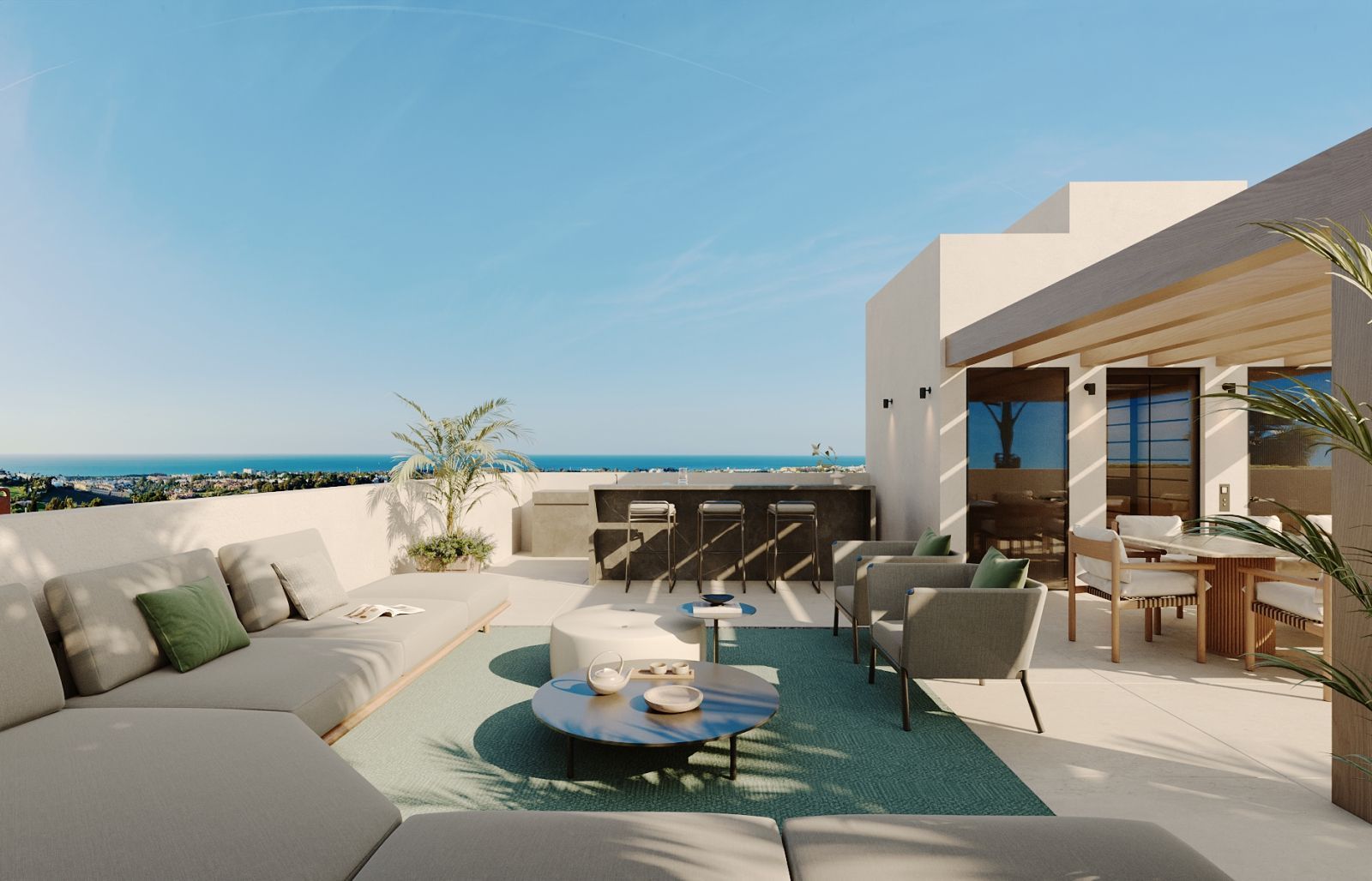 Modern living room with ocean view, featuring a sofa, coffee table, and dining area.